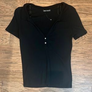 A simple black blouse with collar detail from Zara